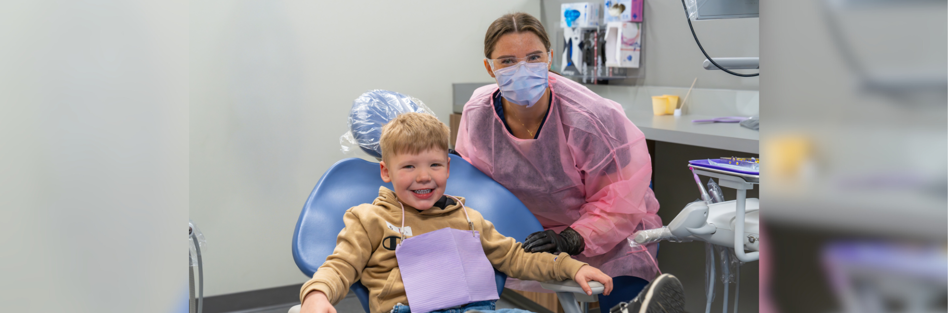 Kaitlyn Simpson, a student in Macomb Community College’s Dental Hygiene program and resident of Cottrellville Township, with one of the children who was provided free dental services during the 2025 Give Kids a Smile Day.