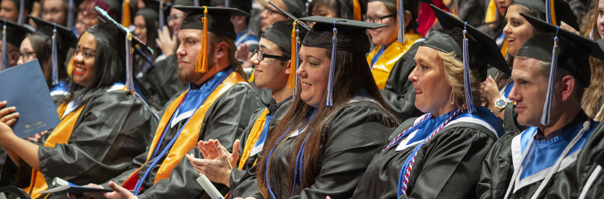 Graduates eagerly await to cross the stage for the 108th commencement ceremony.